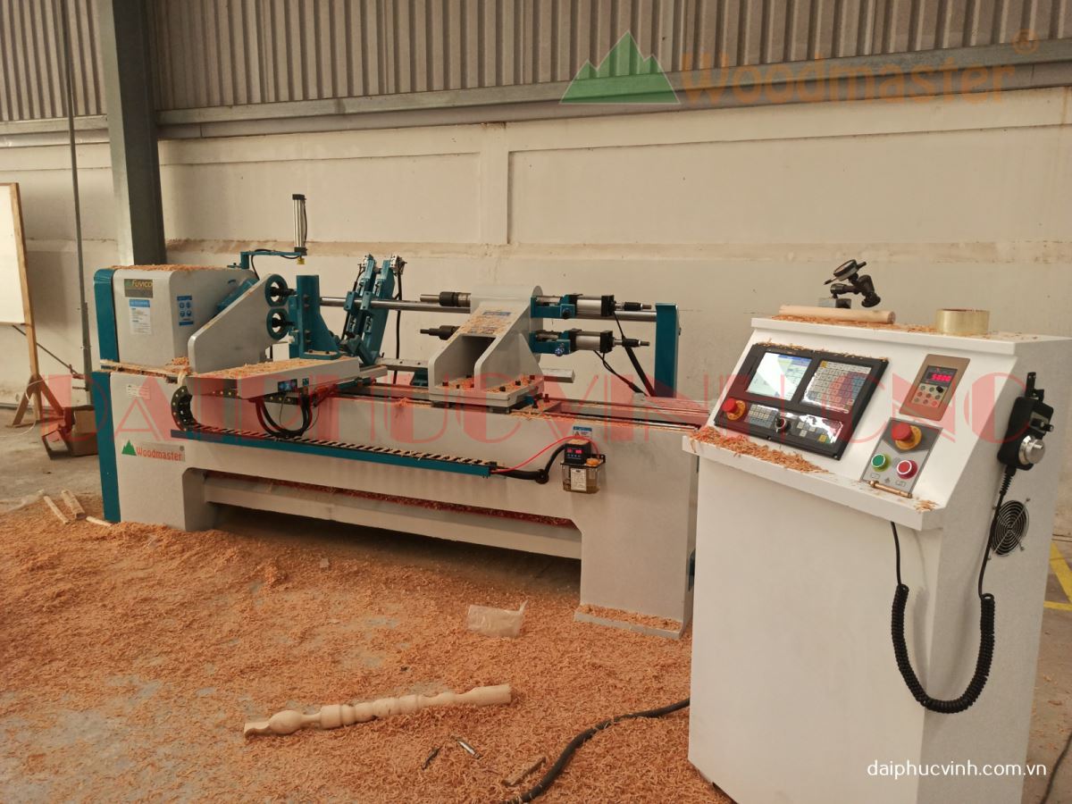 Máy tiện gỗ CNC 2 trục nạp phôi làm việc đồng thời WM-1500A2 8280
